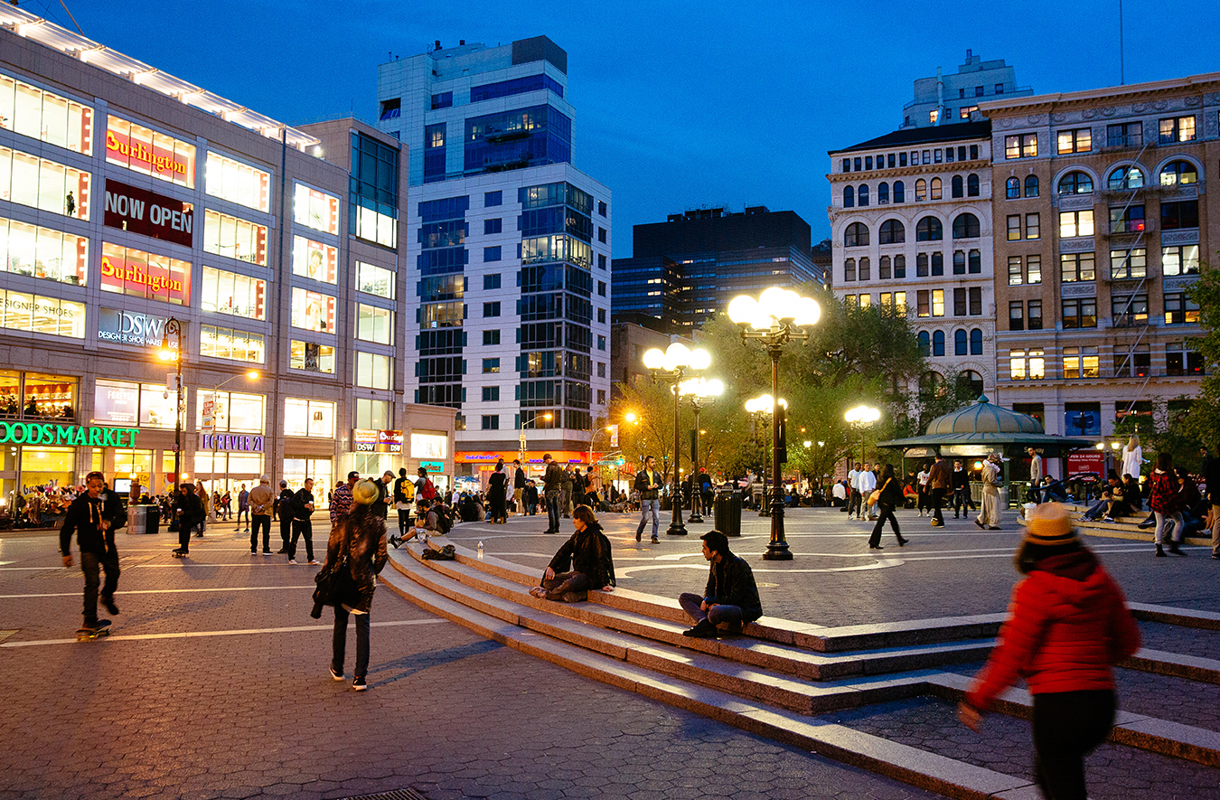 Locals sitting on steps at Union Square plaza